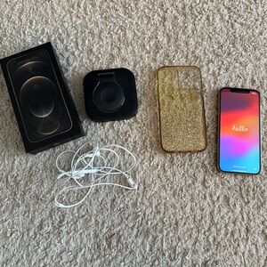 Apple iPhone with Black and Gold Accessories